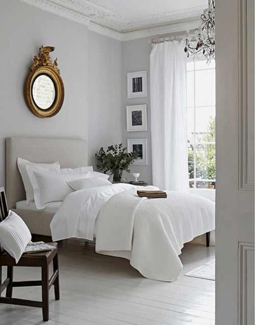Brilliant White Egyptian cotton pillowcases on a bright bedroom bed